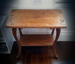 The table was made and carved by Ada.